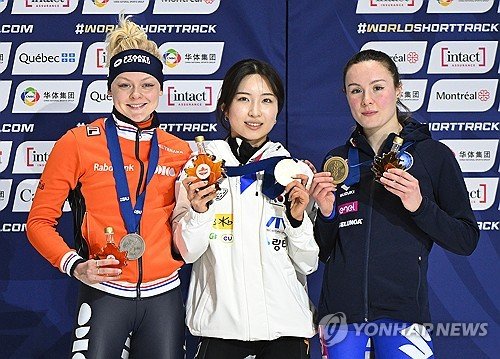 Olympic short track medalists win world titles in Montreal